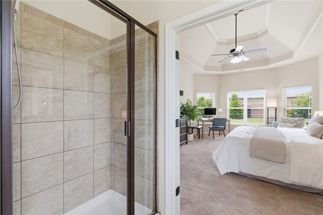 138 Buckland Drive Anderson, SC 29621 - Photo 27 of 49 This spacious bedroom with its elegant tray ceiling creates an inviting and airy retreat.