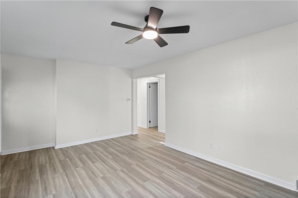 1305 Main Street Bridgeville, PA 15017 - Photo 12 of 50 wooden floor in an empty room