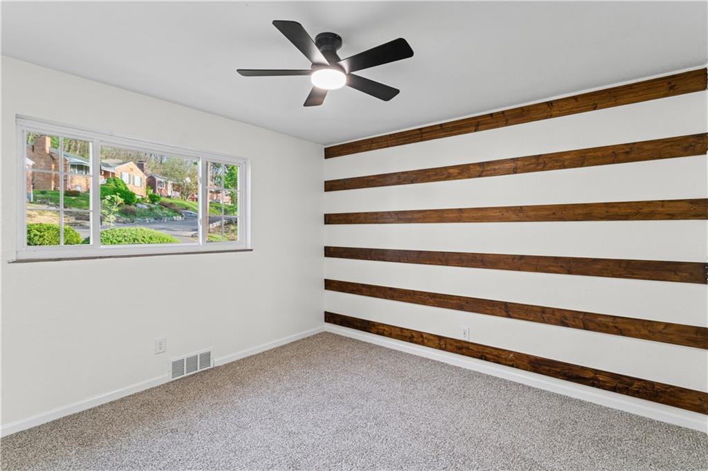 1305 Main Street Bridgeville, PA 15017 - Photo 17 of 50 a view of an empty room with a window