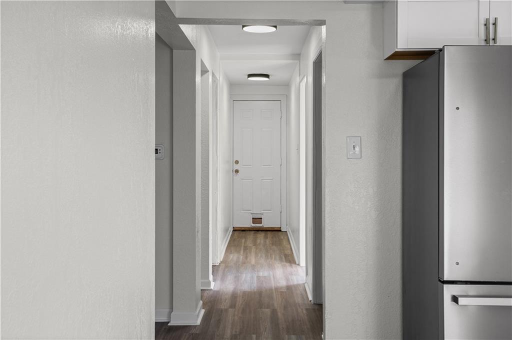 1305 Main Street Bridgeville, PA 15017 - Photo 21 of 50 a view of hallway with wooden floor