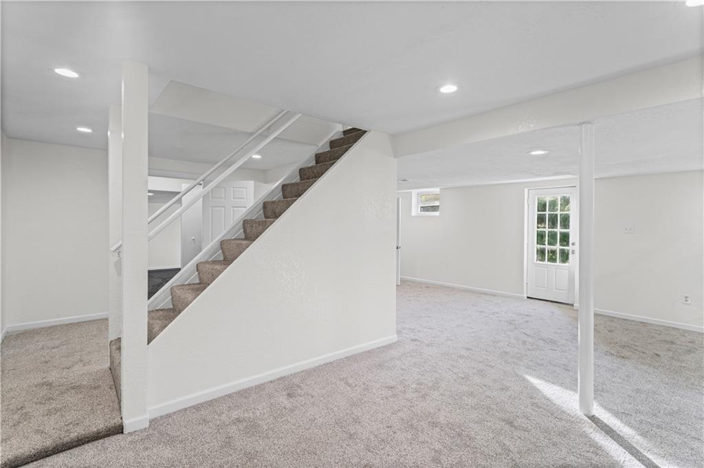 1305 Main Street Bridgeville, PA 15017 - Photo 27 of 50 a view of an empty room with stairs