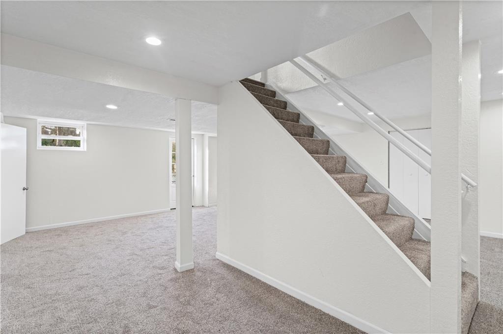 1305 Main Street Bridgeville, PA 15017 - Photo 31 of 50 an entryway in an empty room with stairs