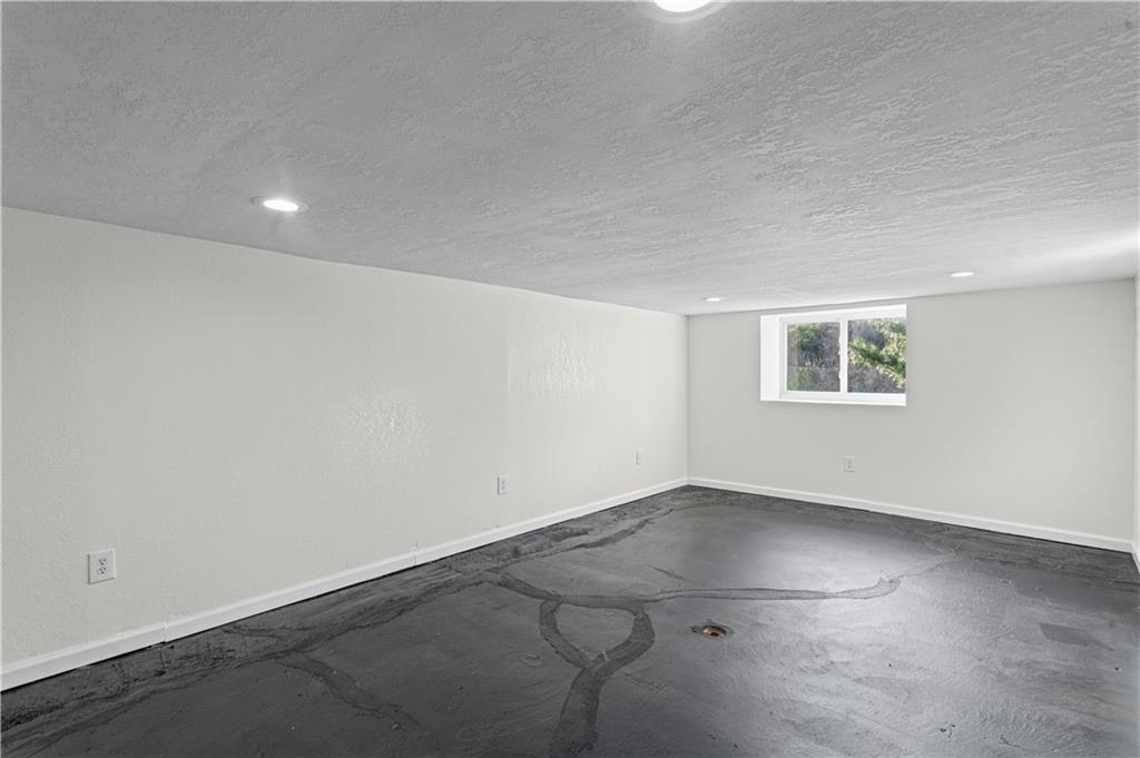 1305 Main Street Bridgeville, PA 15017 - Photo 33 of 50 an empty room with a empty space and window