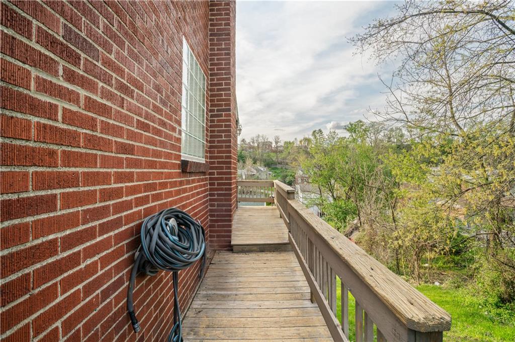 1305 Main Street Bridgeville, PA 15017 - Photo 38 of 50 a view of balcony with wooden floor