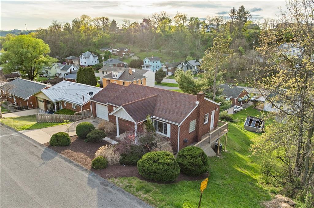 1305 Main Street Bridgeville, PA 15017 - Photo 41 of 50 an aerial view of a house with a garden