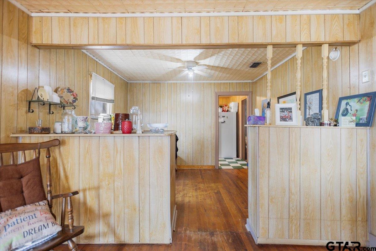 1706 Baxter Avenue Longview, TX 75602 - Photo 17 of 32 a view of a hallway with wooden floor and staircase