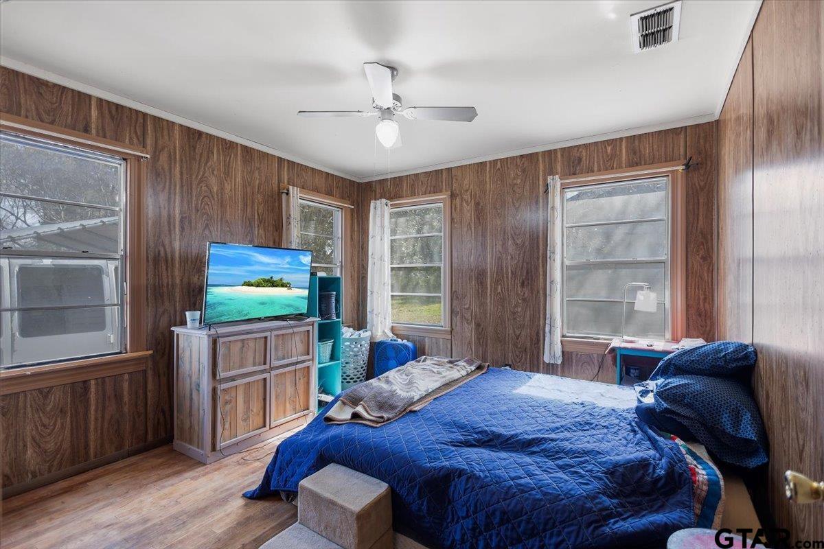 1706 Baxter Avenue Longview, TX 75602 - Photo 2 of 32 a bed room with a bed and a window