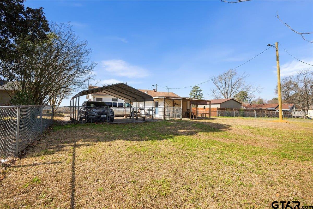 1706 Baxter Avenue Longview, TX 75602 - Photo 26 of 32 a front view of a house with swimming pool