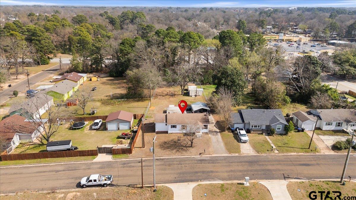 1706 Baxter Avenue Longview, TX 75602 - Photo 28 of 32 an aerial view of residential houses with outdoor space