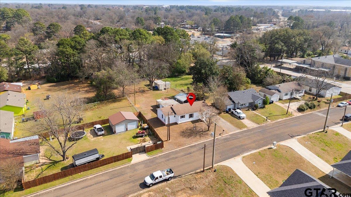 1706 Baxter Avenue Longview, TX 75602 - Photo 30 of 32 an aerial view of a house with yard