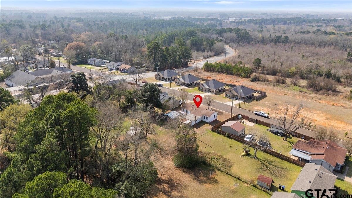 1706 Baxter Avenue Longview, TX 75602 - Photo 32 of 32 a view of a forest with a mountain