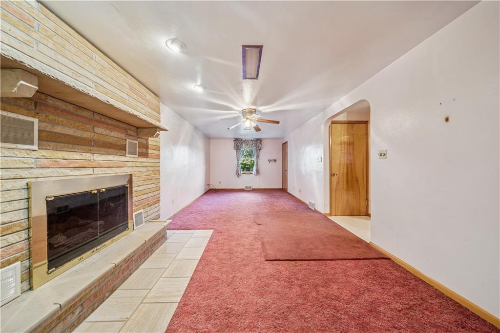 361 Maple Road Pittsburgh, PA 15239 - Photo 14 of 38 a view of an empty room with a fireplace