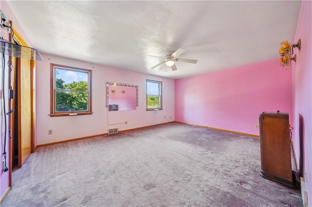 361 Maple Road Pittsburgh, PA 15239 - Photo 22 of 38 an empty room with windows and closet