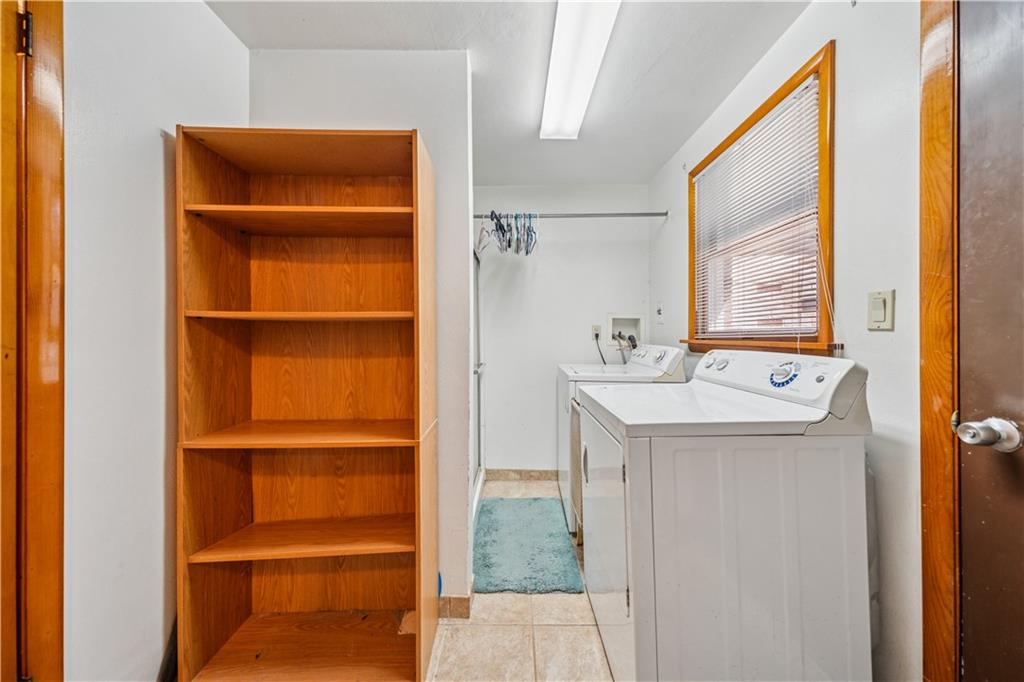 361 Maple Road Pittsburgh, PA 15239 - Photo 26 of 38 a bathroom with a sink and a mirror