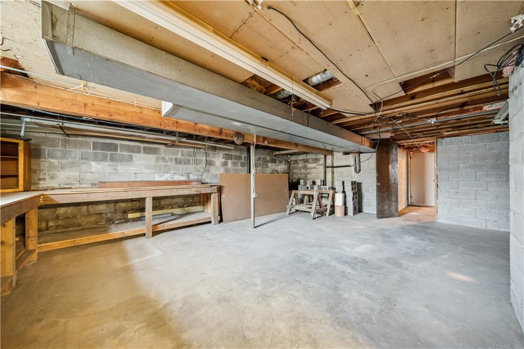 361 Maple Road Pittsburgh, PA 15239 - Photo 29 of 38 a view of an empty room with a garage