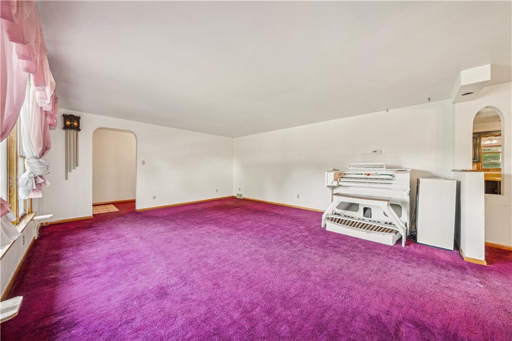 361 Maple Road Pittsburgh, PA 15239 - Photo 3 of 38 a view of empty room with wooden floor