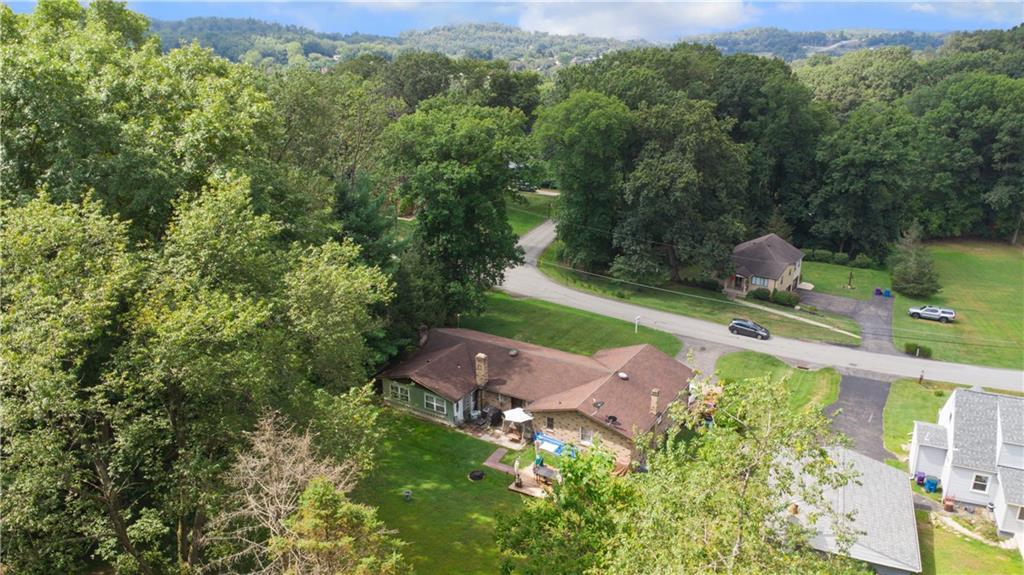 361 Maple Road Pittsburgh, PA 15239 - Photo 34 of 38 an aerial view of a house with a yard