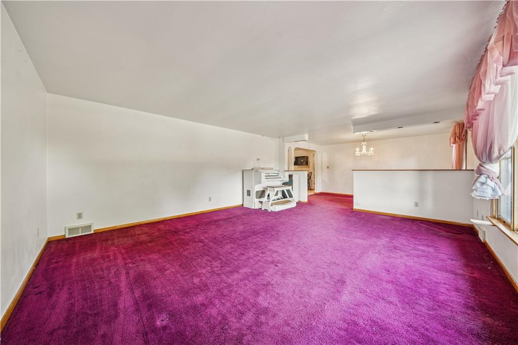 361 Maple Road Pittsburgh, PA 15239 - Photo 4 of 38 a view of empty room with a fireplace