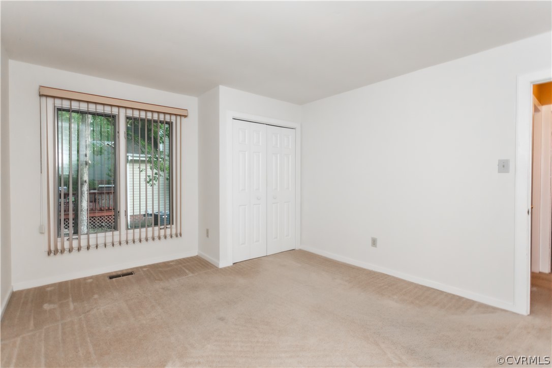 13809 Sandy Oak Road Chester, VA 23831 - Photo 25 of 37 an empty room with windows