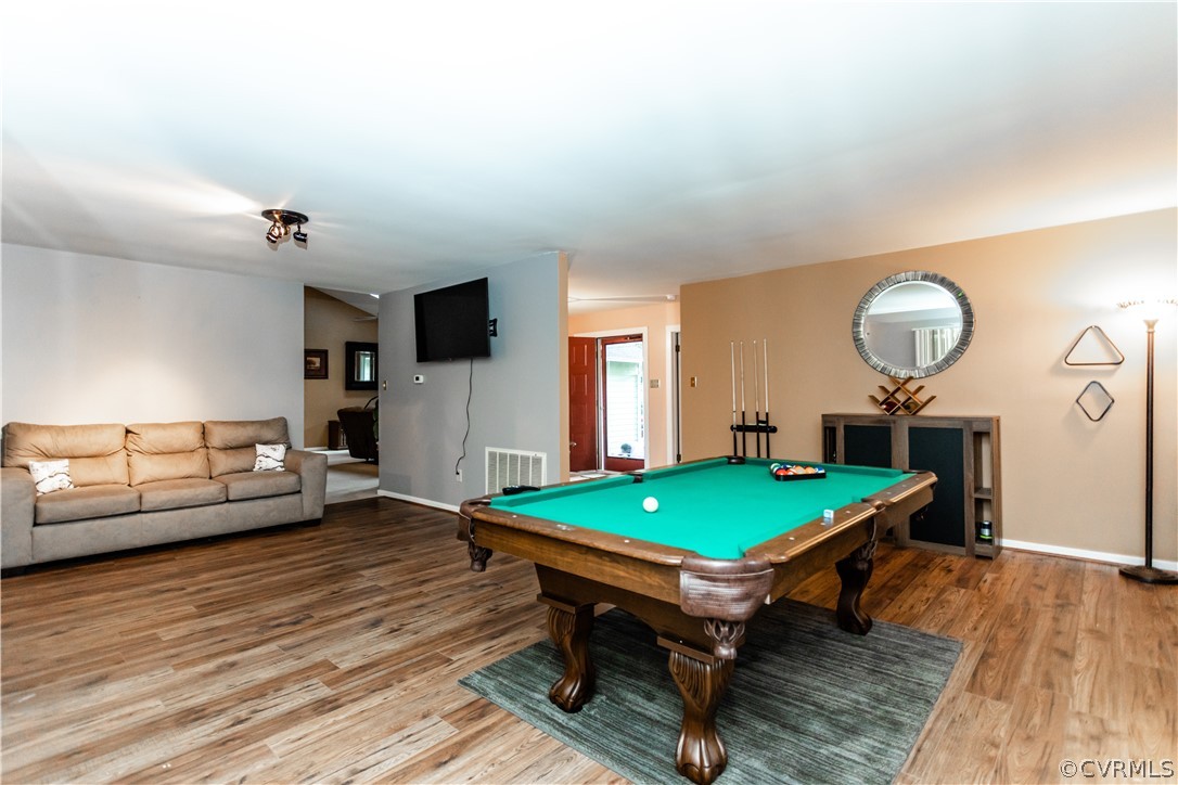 13809 Sandy Oak Road Chester, VA 23831 - Photo 3 of 37 a room with pool table and windows