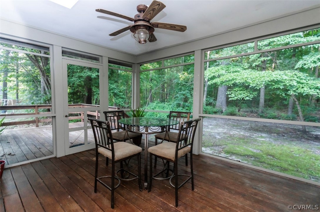 13809 Sandy Oak Road Chester, VA 23831 - Photo 32 of 37 a view of a dining room with furniture window and wooden floor