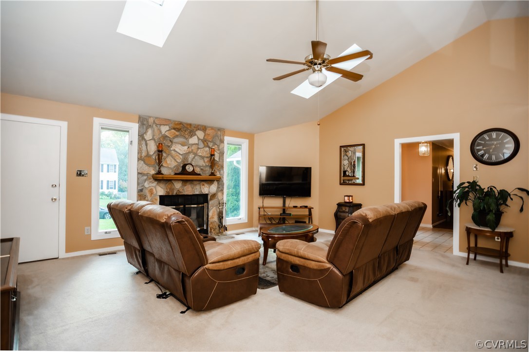13809 Sandy Oak Road Chester, VA 23831 - Photo 8 of 37 a living room with furniture and a flat screen tv
