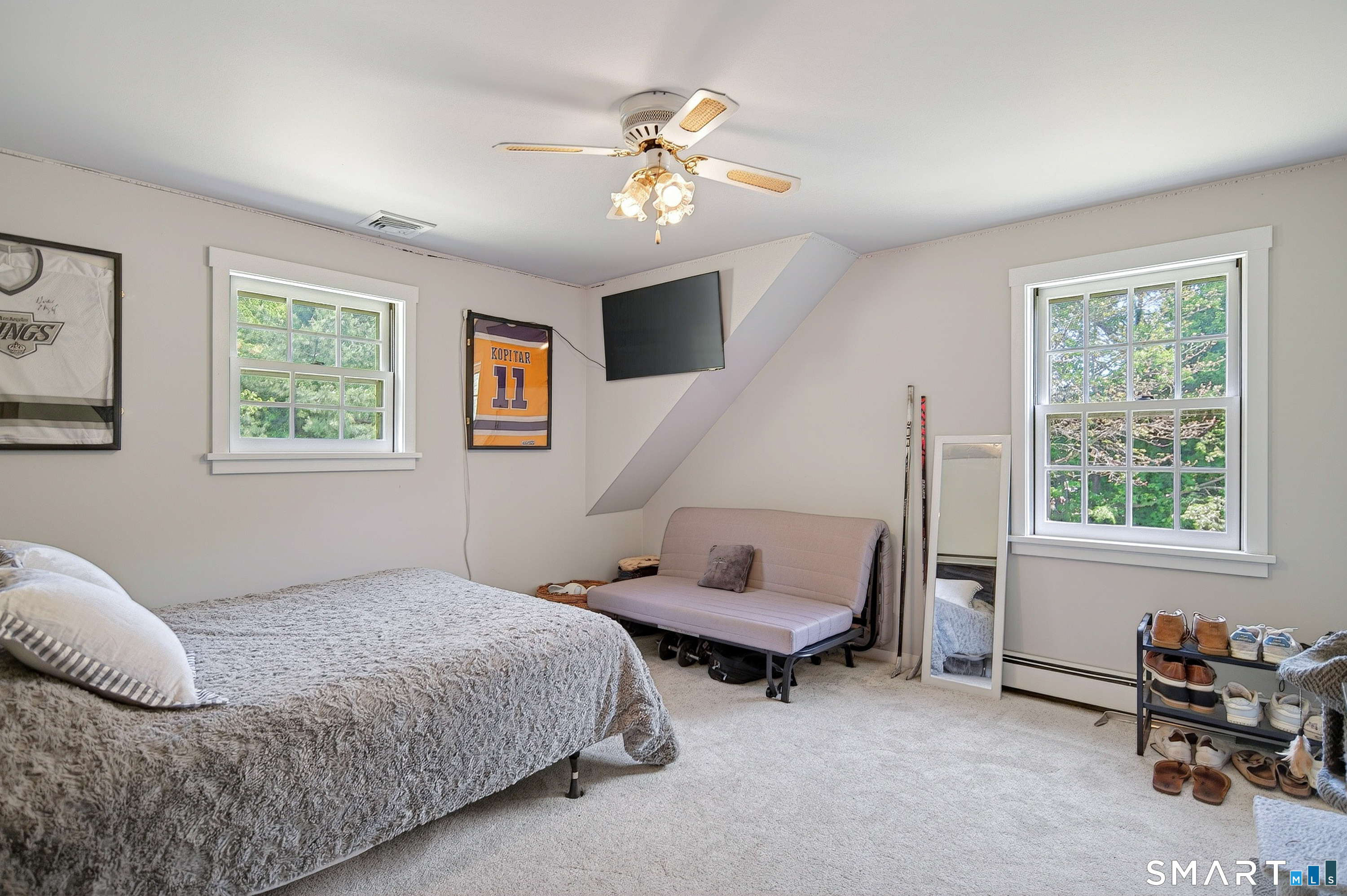 174 Huntingtown Road Newtown, CT 06470 - Photo 19 of 40 a bedroom with bed and a window