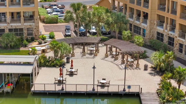 a view of a swimming pool with seating area