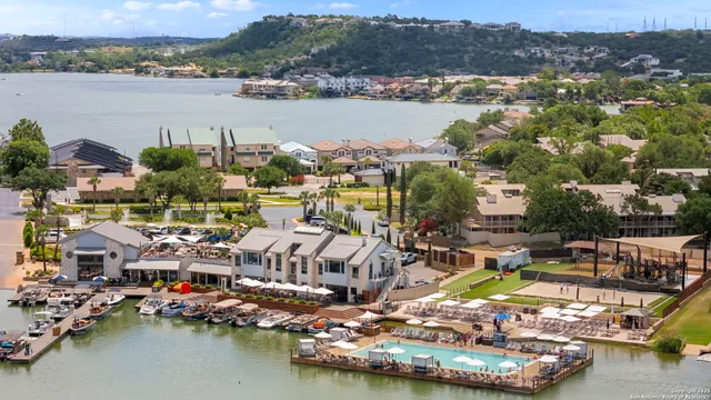 a view of a house with a potted plant and a window