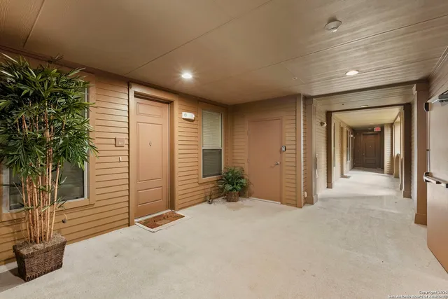 a view of balcony with furniture