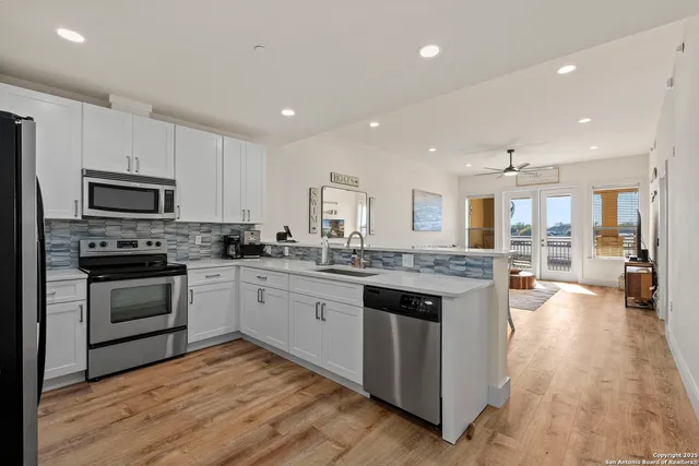 a large kitchen with cabinets