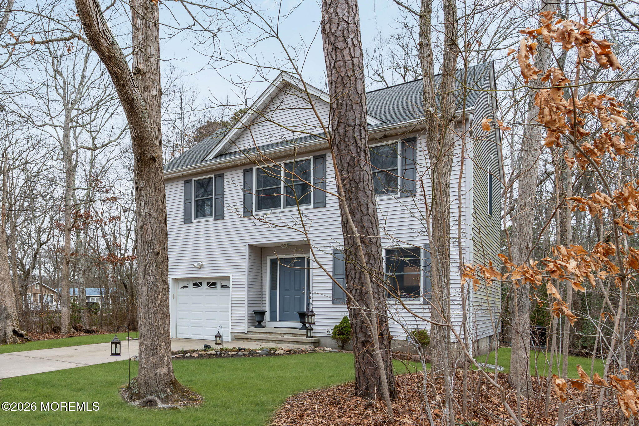 9 Forecastle Way Waretown, NJ 08758 - Photo 2 of 51 a front view of a house with a yard
