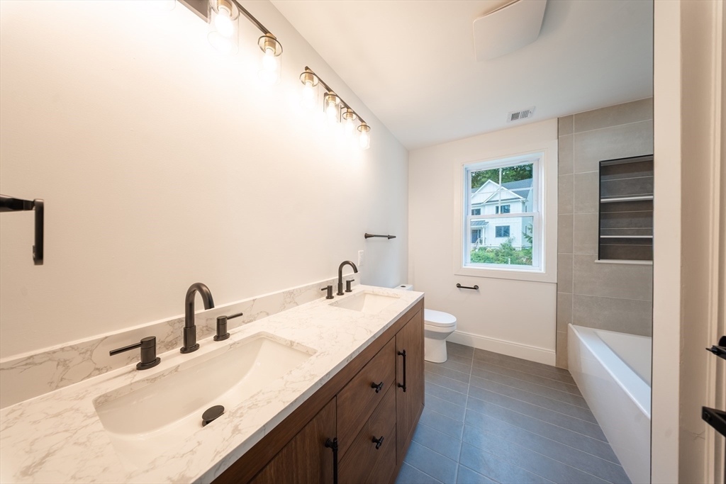 2 Spring Meadow Drive Southborough, MA 01772 - Photo 27 of 42 a bathroom with a sink and a mirror
