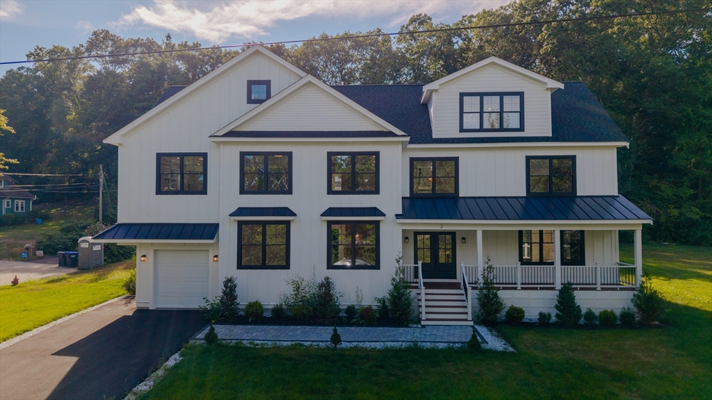 2 Spring Meadow Drive Southborough, MA 01772 - Photo 41 of 42 a front view of a house with a yard