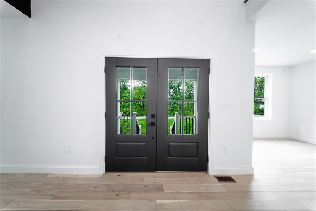 2 Spring Meadow Drive Southborough, MA 01772 - Photo 6 of 42 a view of entryway with wooden floor