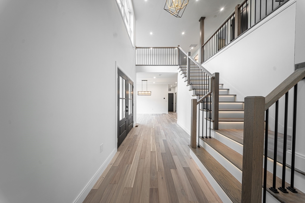 2 Spring Meadow Drive Southborough, MA 01772 - Photo 7 of 42 a view of entryway and hall with wooden floor