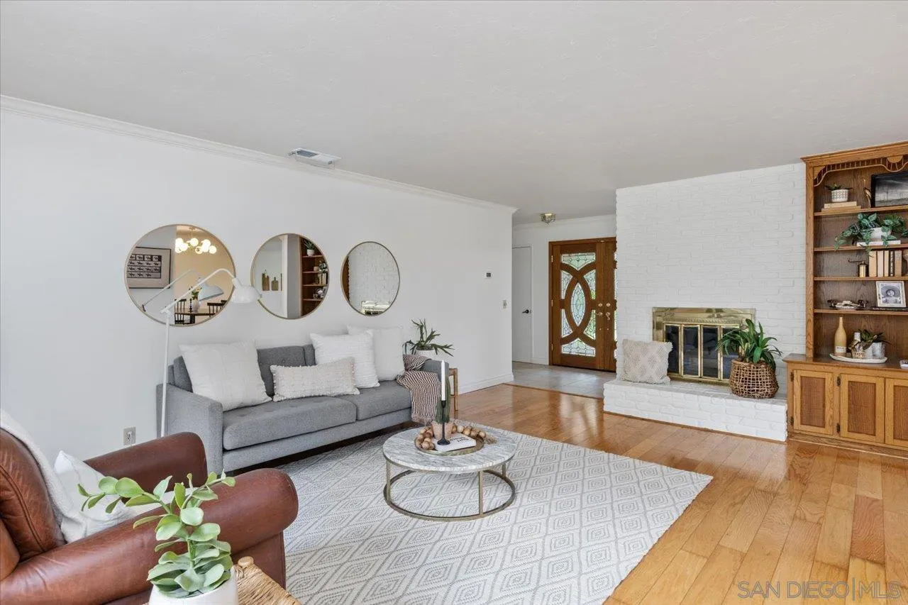 1786 Lorry Lane Escondido, CA 92029 - Photo 11 of 39 a living room with furniture and wooden floor