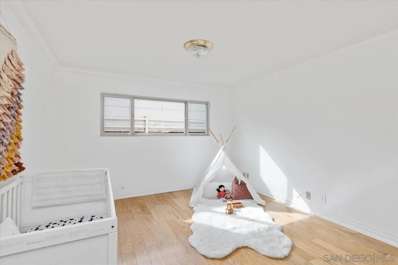 1786 Lorry Lane Escondido, CA 92029 - Photo 30 of 39 a room with toys and wooden floor