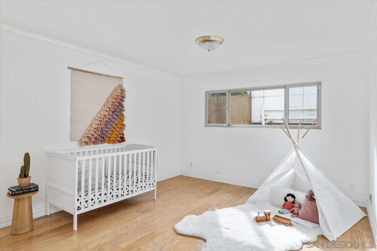 1786 Lorry Lane Escondido, CA 92029 - Photo 8 of 39 a bedroom with furniture and a window