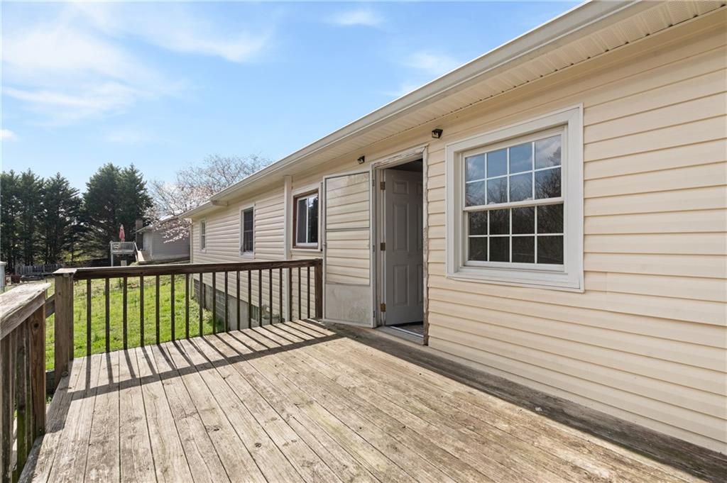 173 Winndale Road Dallas, GA 30157 - Photo 5 of 23 a view of a wooden deck