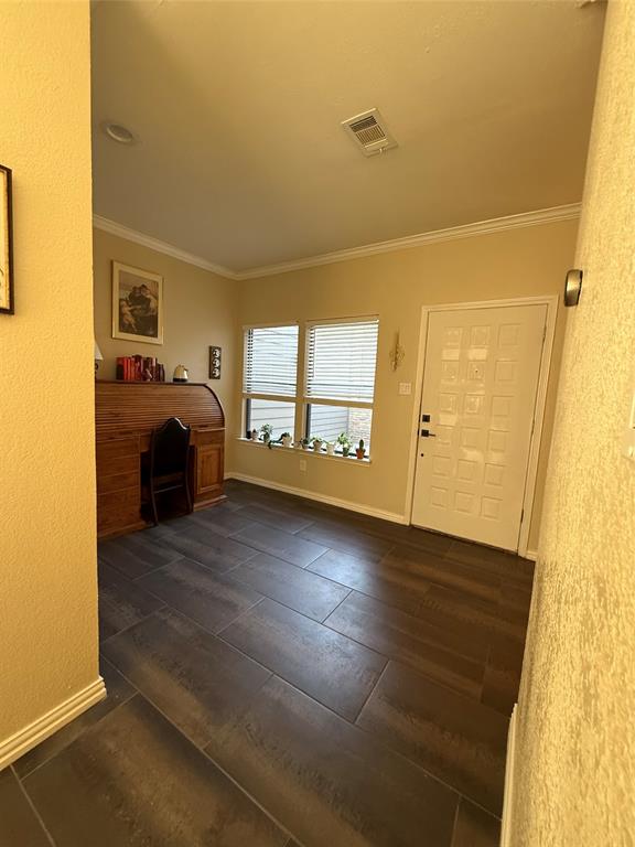 5616 Preston Oaks Road, Unit 1605 Dallas, TX 75254 - Photo 16 of 24 This space greets you upon entry and offers great flex space for your needs.