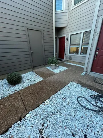 a view of a yard with patio