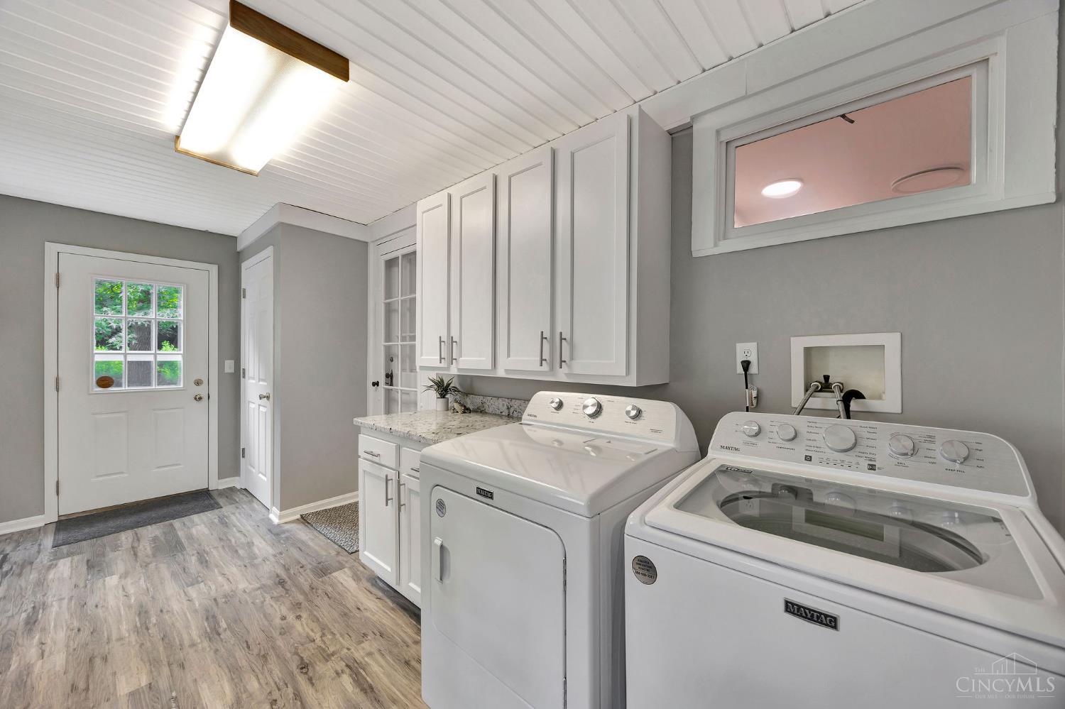 5115 Bonham Road Oxford, OH 45056 - Photo 20 of 24 Utility Room with Walkout and access to 1st Floor Den / Office. Mini-Split Heating and AC. New appliances to stay with the house.