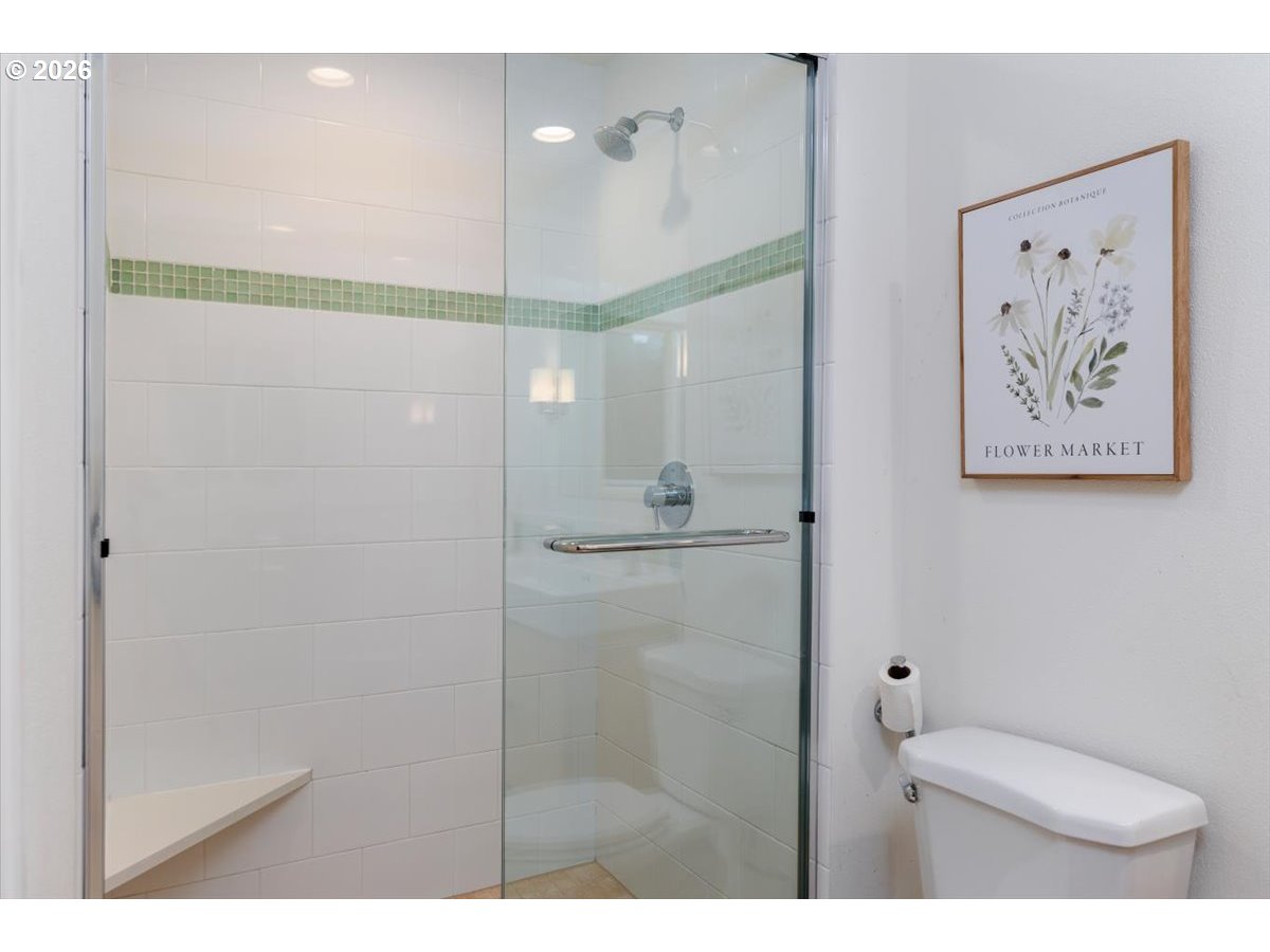 175 Northwest 95th Avenue Portland, OR 97229 - Photo 19 of 46 a bathroom with a shower and toilet