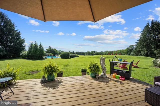 a view of a terrace with sitting area