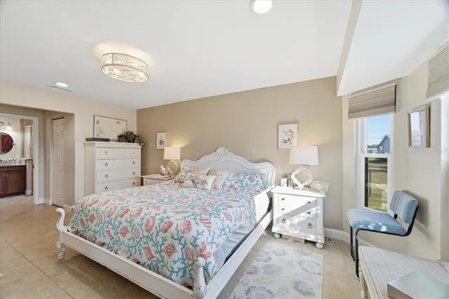 a bedroom with a bed and furniture