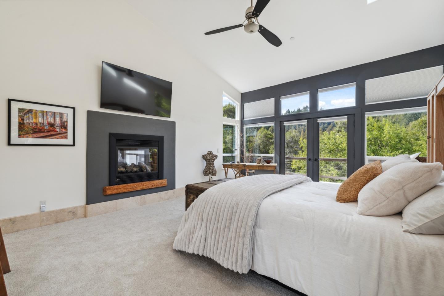 400 Dorrance Road Boulder Creek, CA 95006 - Photo 21 of 62 a bedroom with a bed and a fireplace
