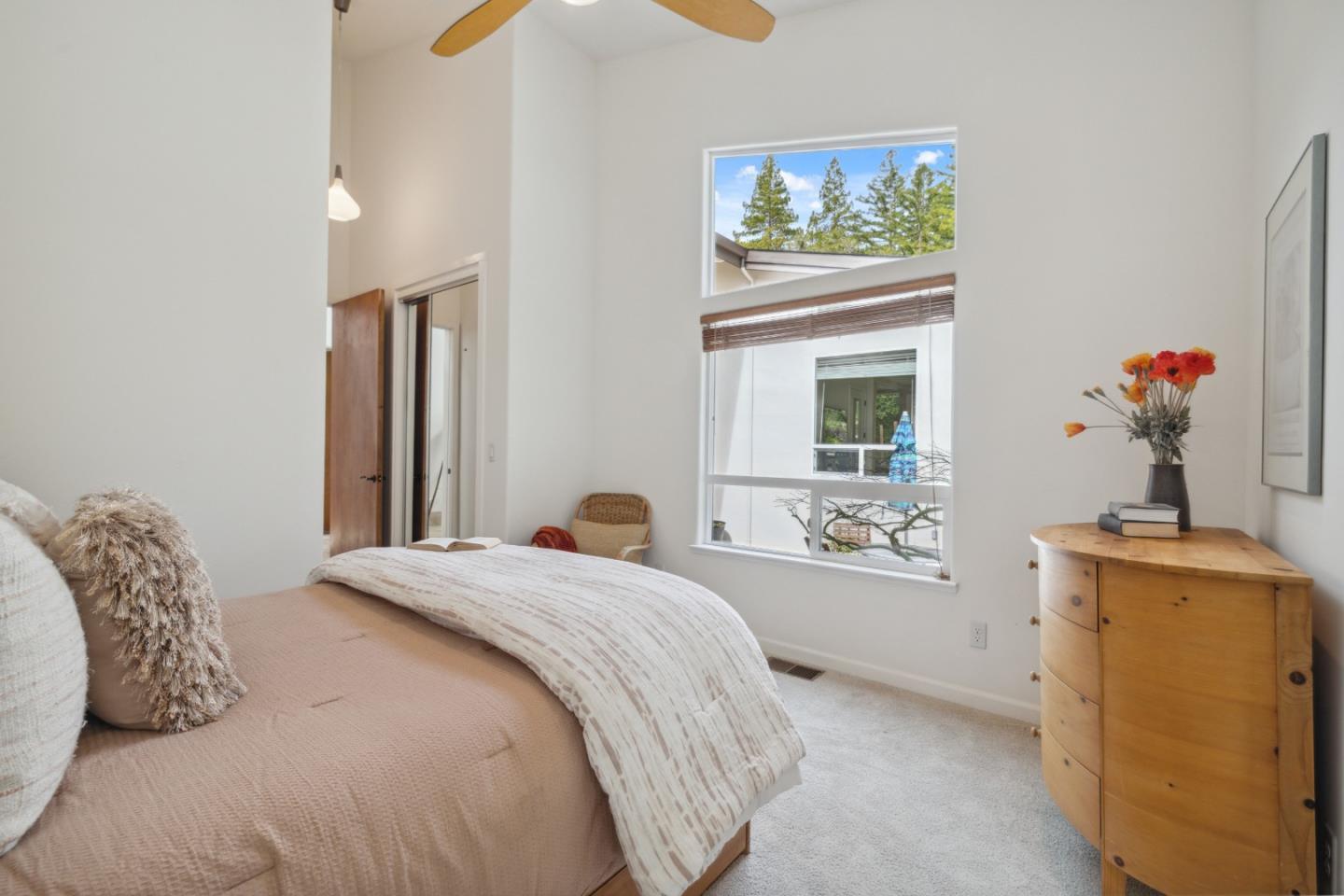 400 Dorrance Road Boulder Creek, CA 95006 - Photo 29 of 62 a bedroom with a bed and a window