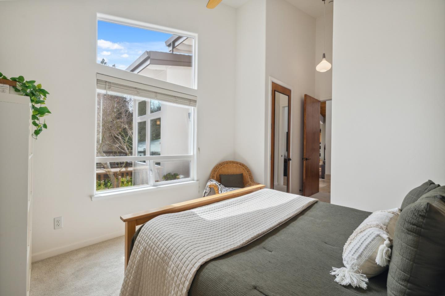 400 Dorrance Road Boulder Creek, CA 95006 - Photo 31 of 62 a bedroom with a bed and a window