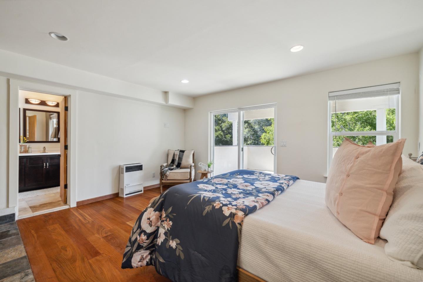 400 Dorrance Road Boulder Creek, CA 95006 - Photo 33 of 62 a bedroom with a large bed and wooden floor